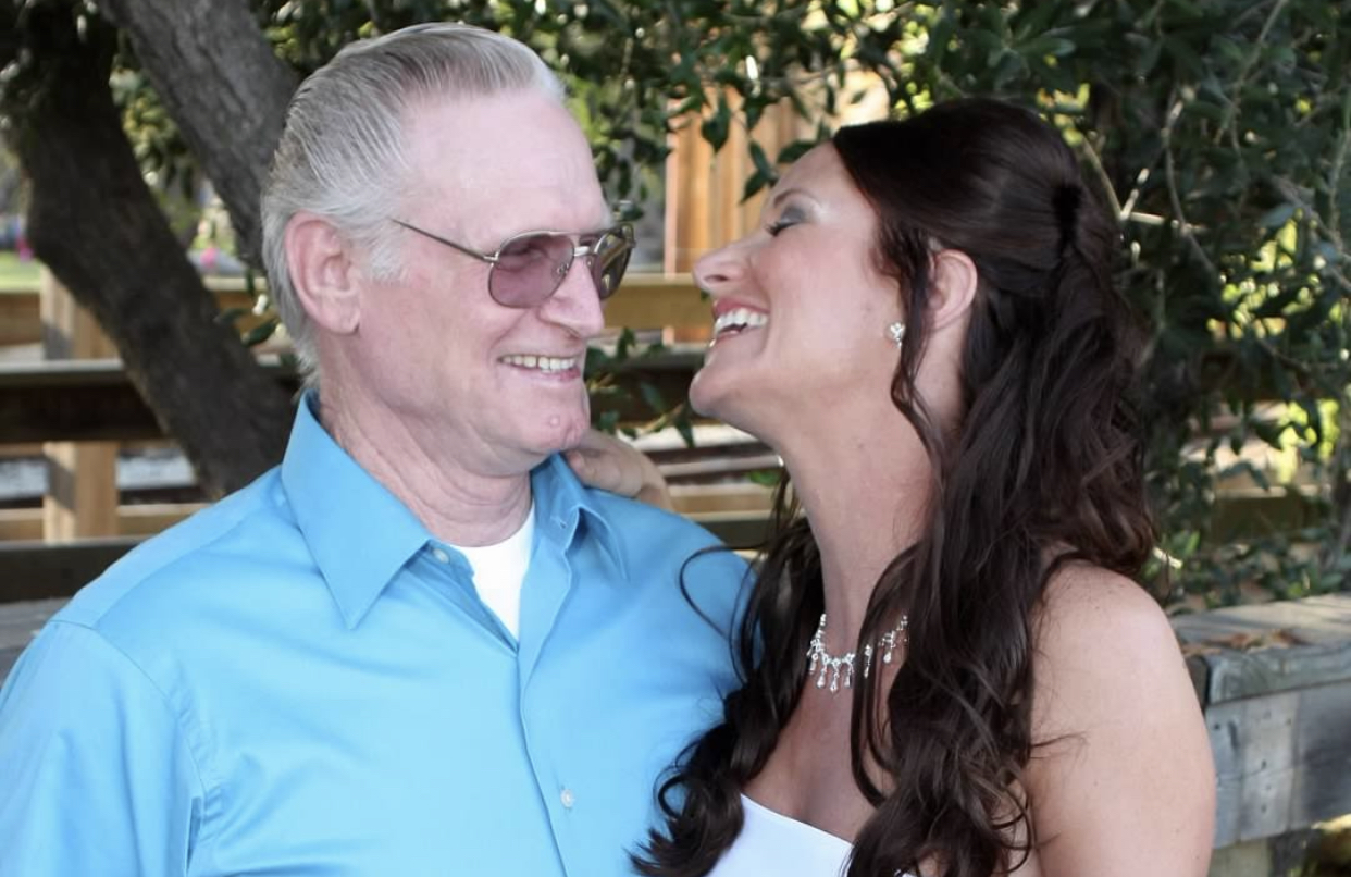 Satin laughing with her dad Richard at her wedding